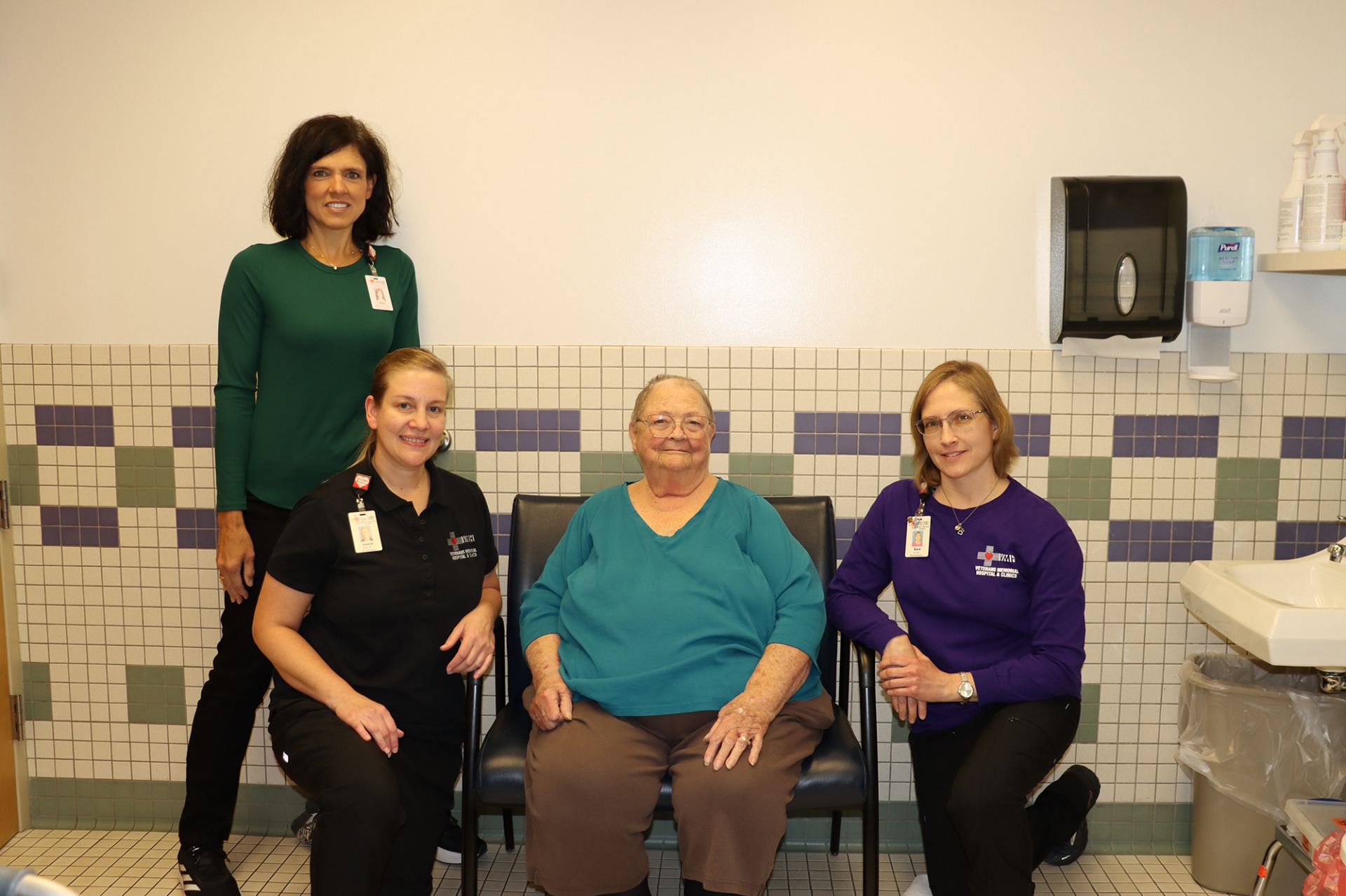 Veterans Memorial Hospital staff members with a wound care patient.